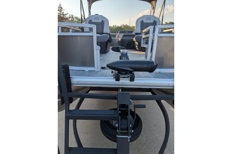 Slide: The Image of 2026 Sun Tracker Bass Buggy 16 XL Select pontoon boat with seating and entry ladder. - 81