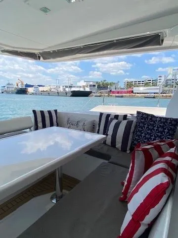 Slide: The Image of Leopard 43 PC 2019 yacht with stylish cushions and sea view. - 10