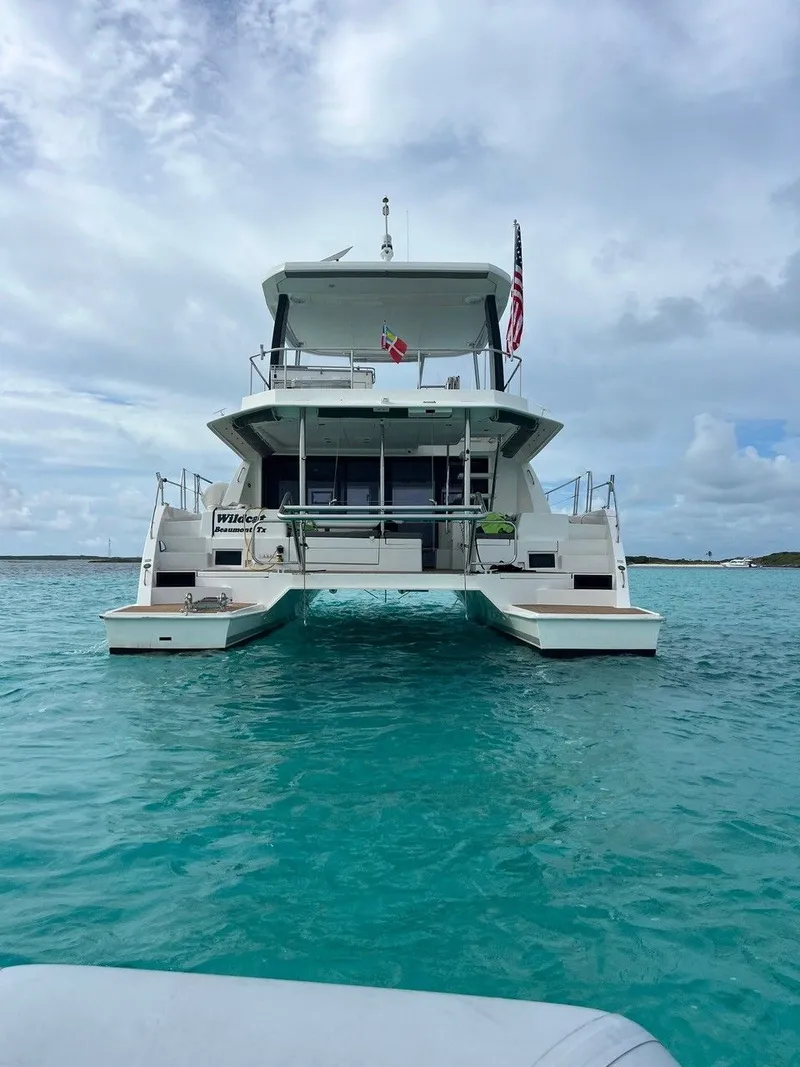 Slide: The Image of Leopard 43 PC 2019 catamaran on turquoise water. - 2