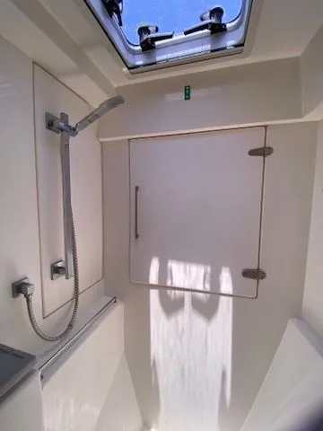 Slide: The Image of Interior of 2019 Leopard 43 PC with shower and window. - 25