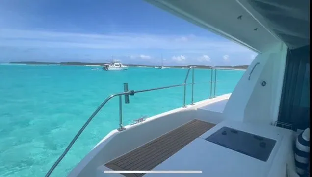 Slide: The Image of Leopard 43 PC 2019 on turquoise waters with clear skies. - 31