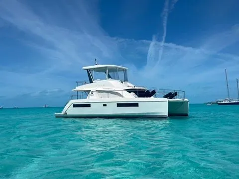 Slide: The Image of Leopard 43 PC 2019 on turquoise water under blue sky. - 33
