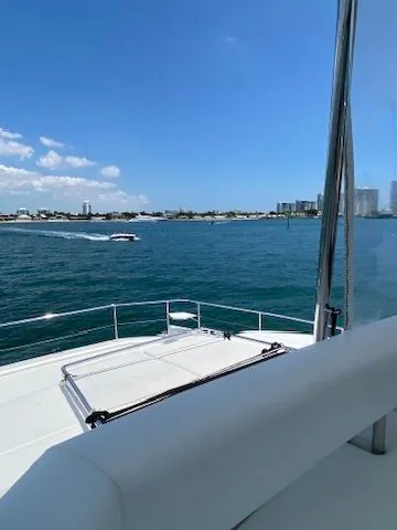 Slide: The Image of Leopard 43 PC 2019 yacht on open sea with city view. - 8