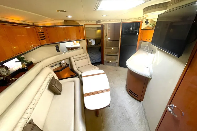 Slide: The Image of SALON OVERVIEW LOOKING AFT TO SECOND VIP GUEST STATROOM THAT CONVERTS TO A SETEE - 17