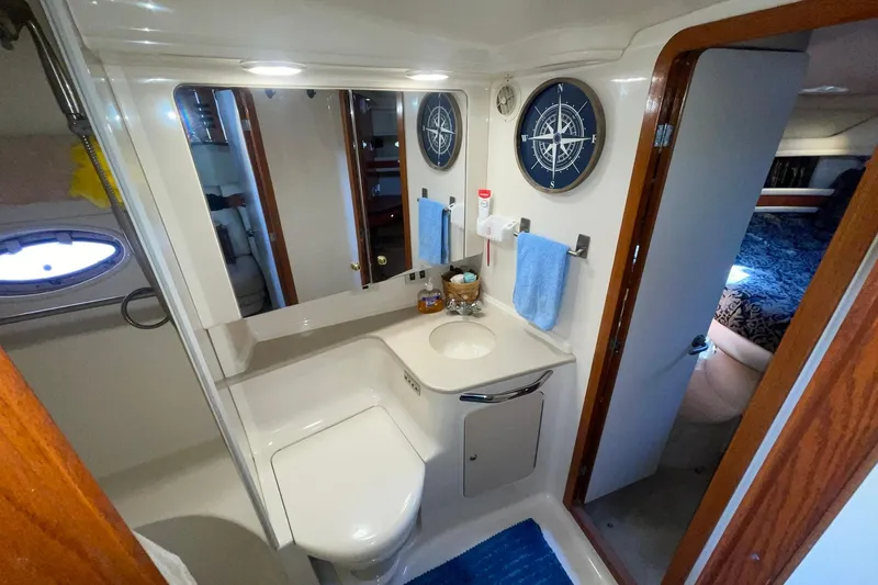 Slide: The Image of MASTER HEAD W/VANITY SINK & STORAGE CABINET BELOW & OVERHEAD - 35