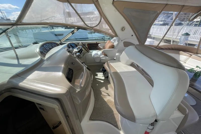 Slide: The Image of HELM DECK OVERVIEW WITH DOUBLE BENCH COMPANION SEATING & A CAPTAINS CHAIR W/ARMRESTS AND FLI-UP BOLSTER - 48