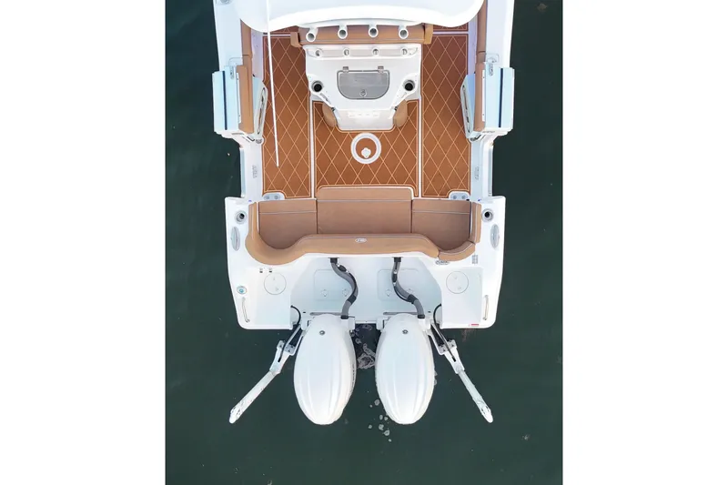 Slide: The Image of 2024 Sea Hunt Ultra 265 SE boat, aerial view of deck and dual engines. - 51