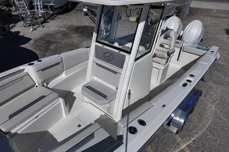 Slide: The Image of 2026 Sailfish 252 CC boat with spacious seating and modern design. - 9