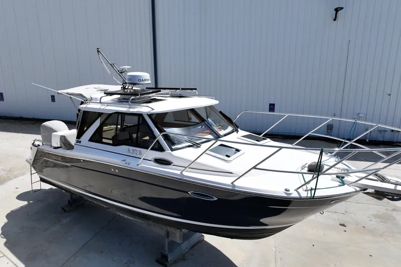 The Image of 2022 Cutwater C-248 Coupe boat on display, featuring sleek design and modern equipment. - 0