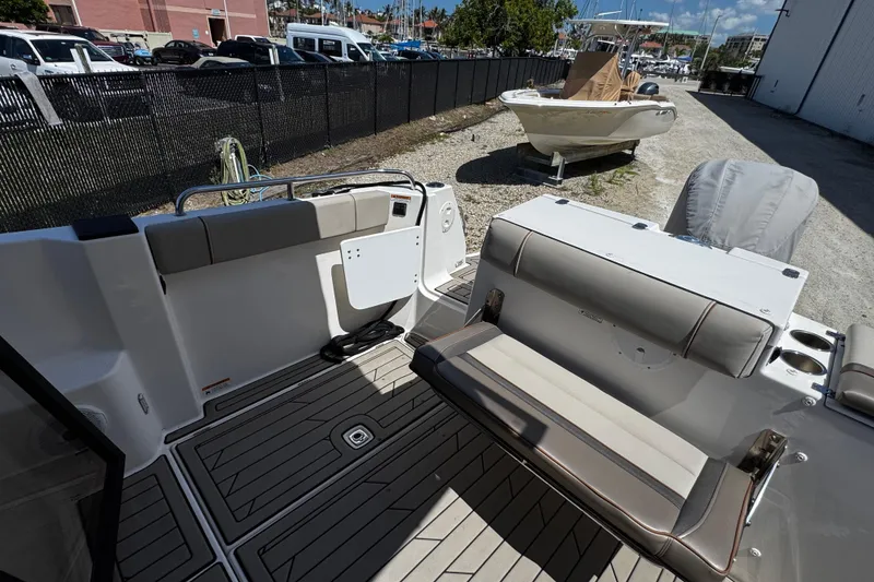 Slide: The Image of 2022 Cutwater C-248 Coupe boat interior with seating and deck details. - 10
