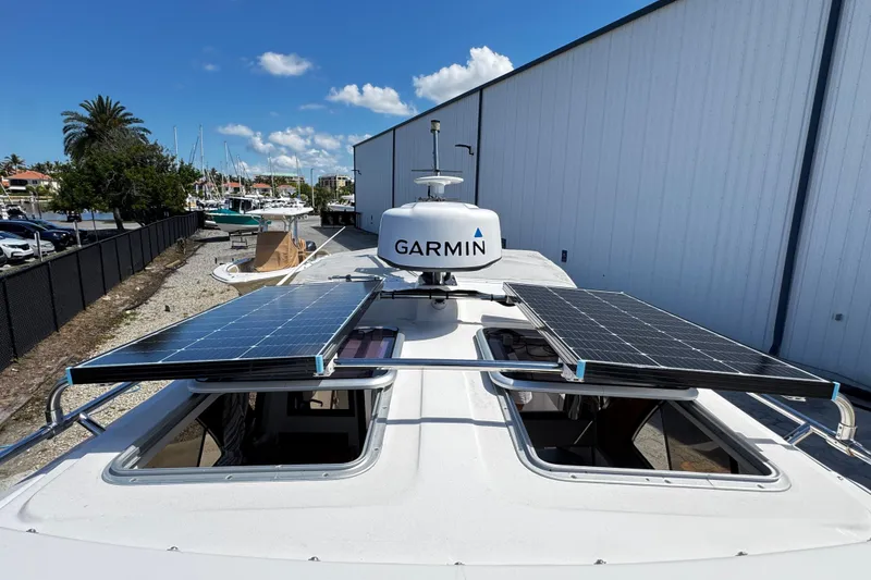 Slide: The Image of 2022 Cutwater C-248 Coupe with solar panels and Garmin radar on the roof. - 24