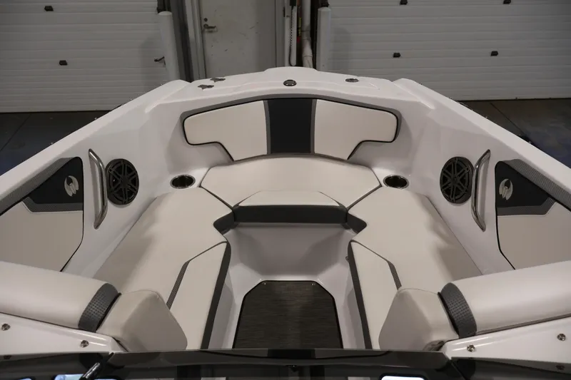 Slide: The Image of Interior of 2021 Scarab 215 ID boat with sleek seating and speakers. - 10