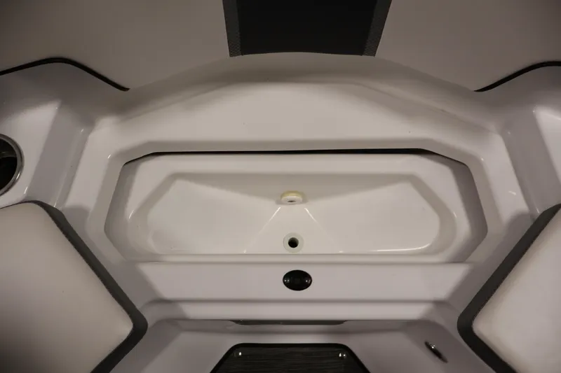 Slide: The Image of Interior view of 2021 Scarab 215 ID boat storage compartment. - 12