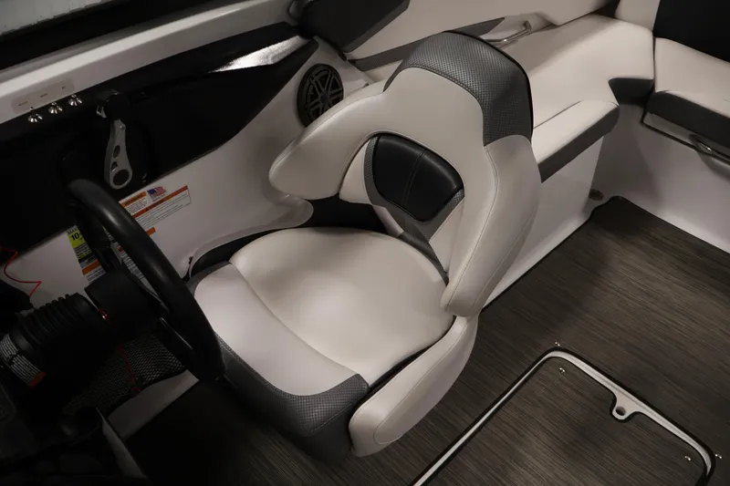 Slide: The Image of 2021 Scarab 215 ID boat interior with sleek seating and modern design. - 25