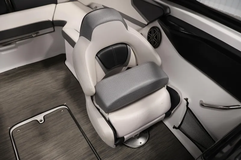 Slide: The Image of 2021 Scarab 215 ID boat interior with modern seating and speaker system. - 32