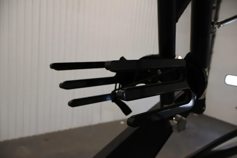 Slide: The Image of Close-up of a 2021 Scarab 215 ID boat component in a garage setting. - 39