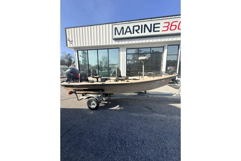 The Image of 2006 HIGH TIDE 15 boat on trailer outside Marine 360 dealership. - 1