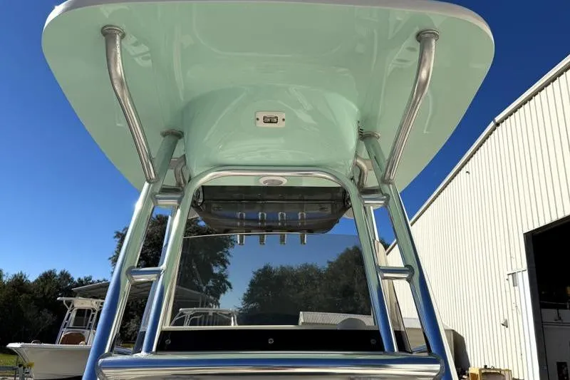 Slide: The Image of 2024 Key West 239 FS boat with T-top and stainless steel frame. - 16