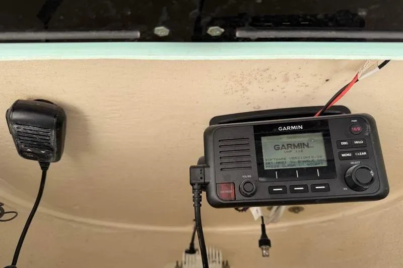 Slide: The Image of Garmin marine radio installed on 2024 Key West 239 FS boat dashboard. - 27