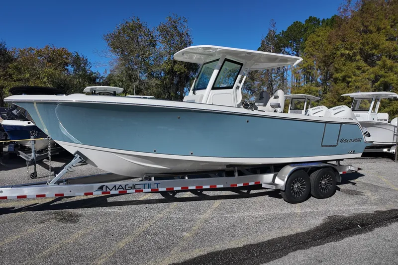 The Image of 2026 Sailfish 272 CC boat on trailer, parked outdoors, side view. - 0