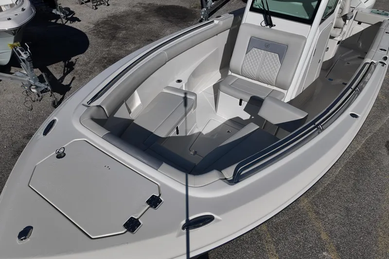 Slide: The Image of 2026 Sailfish 272 CC boat with spacious seating and sleek design. - 8