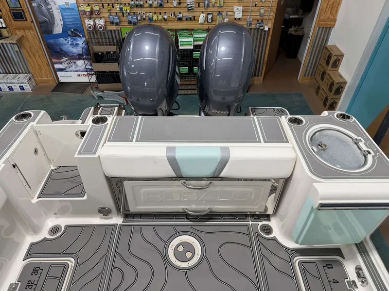 Slide: The Image of 2023 Robalo R250 Center Console featuring dual engines and sleek cockpit design. - 16
