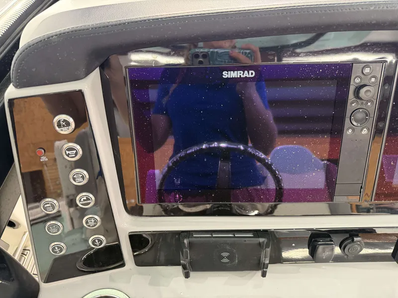 Slide: The Image of 2023 Robalo R250 Center Console with Simrad display. - 24