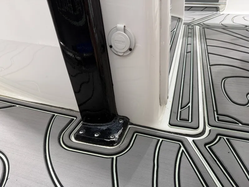 Slide: The Image of Close-up of the 2023 Robalo R250 Center Console flooring. - 28