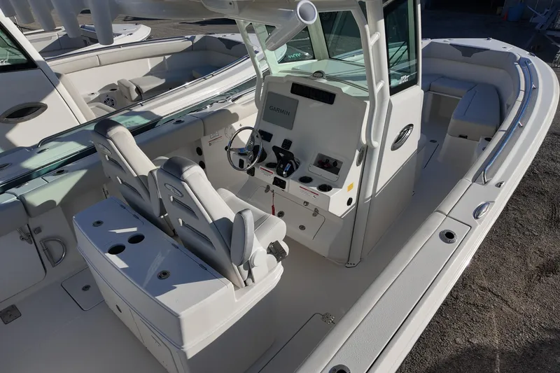 Slide: The Image of 2026 Sailfish 272 CC boat interior with dual seats and modern console. - 5