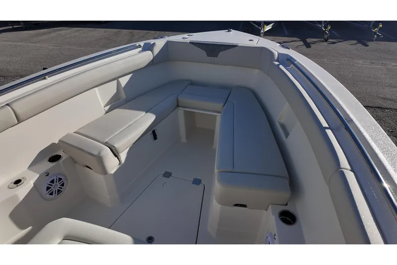 Slide: The Image of Interior view of 2026 Sailfish 272 CC boat with cushioned seating. - 7