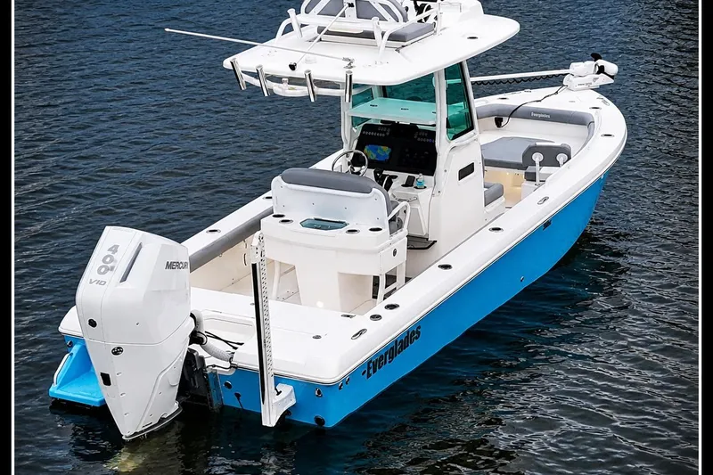 The Image of 2024 Everglades 253 Center Console boat on water, featuring sleek design and powerful engine. - 0