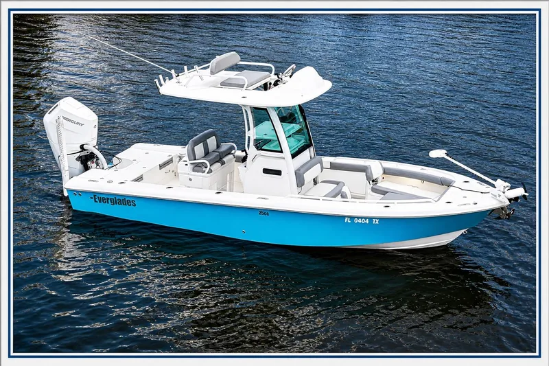 Slide: The Image of 2024 Everglades 253 Center Console boat on water, featuring sleek design and modern amenities. - 6