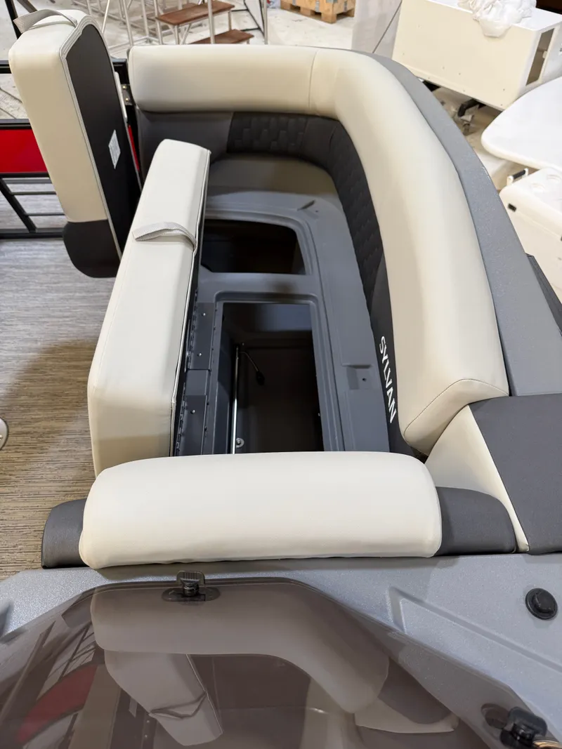 Slide: The Image of Interior view of 2026 Sylvan R-22 CLZ DH with beige seating area. - 10