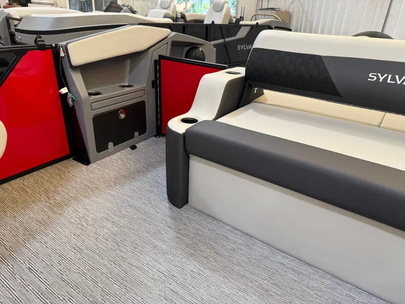 Slide: The Image of Interior of 2026 Sylvan R-22 CLZ DH with gray and red accents. - 14