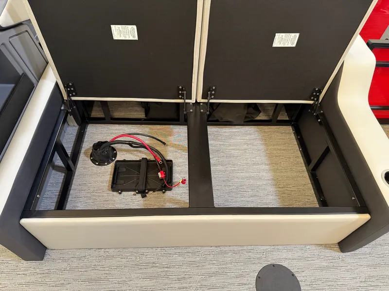 Slide: The Image of Interior view of 2026 Sylvan R-22 CLZ DH with open storage compartment. - 18
