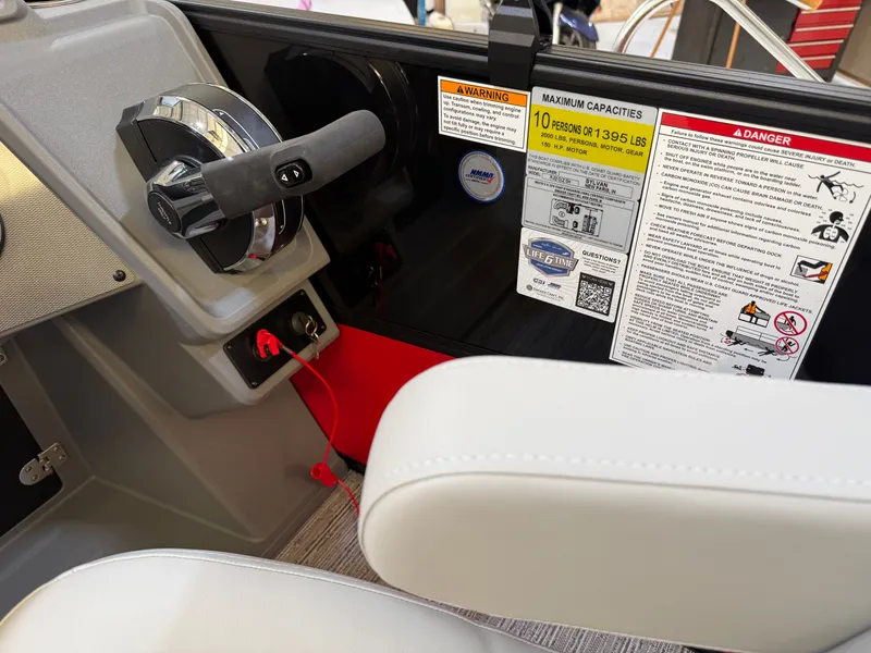 Slide: The Image of Sylvan R-22 CLZ DH 2026 helm with safety labels. - 21