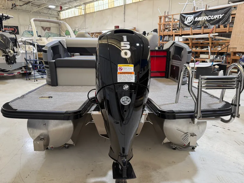 Slide: The Image of Sylvan R-22 CLZ DH 2026 pontoon boat with Mercury outboard motor. - 22