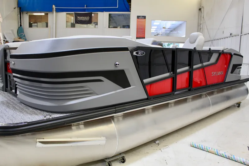 Slide: The Image of Sylvan R-22 CLZ DH 2026 pontoon boat in a workshop. - 3
