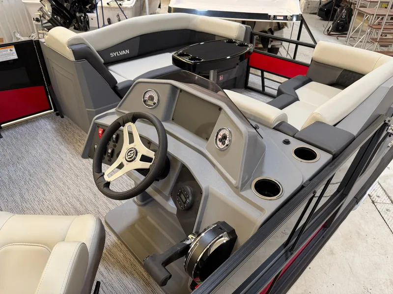 Slide: The Image of Interior of 2026 Sylvan R-22 CLZ DH with steering wheel and seating. - 4