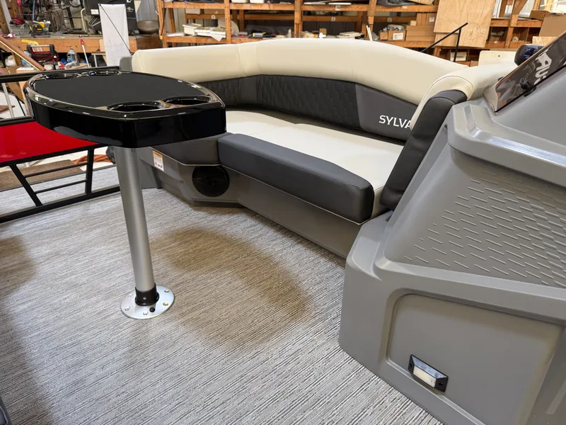 Slide: The Image of Interior of 2026 Sylvan R-22 CLZ DH with table and seating area. - 8
