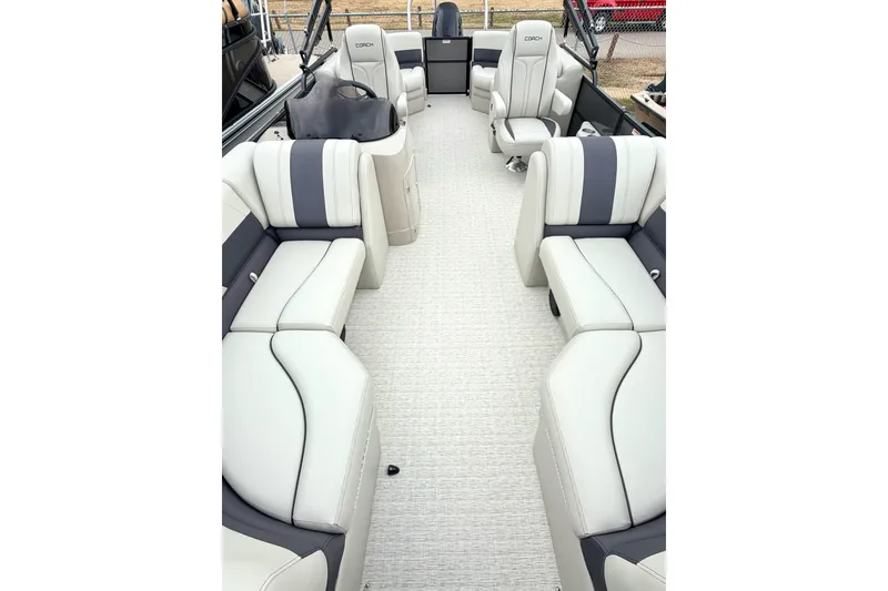 Slide: The Image of Luxurious interior of 2026 Coach Pontoons 223 RFC with plush seating and modern design. - 21