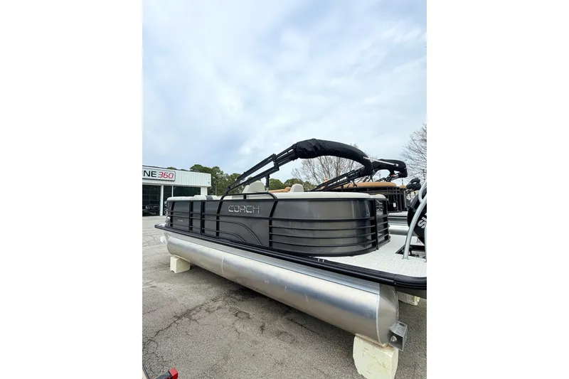 Slide: The Image of 2026 Coach Pontoons 223 RFC pontoon boat displayed outdoors. - 3