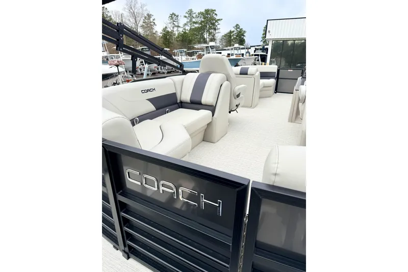 Slide: The Image of 2026 Coach Pontoons 223 RFC interior with luxurious seating and modern design. - 4