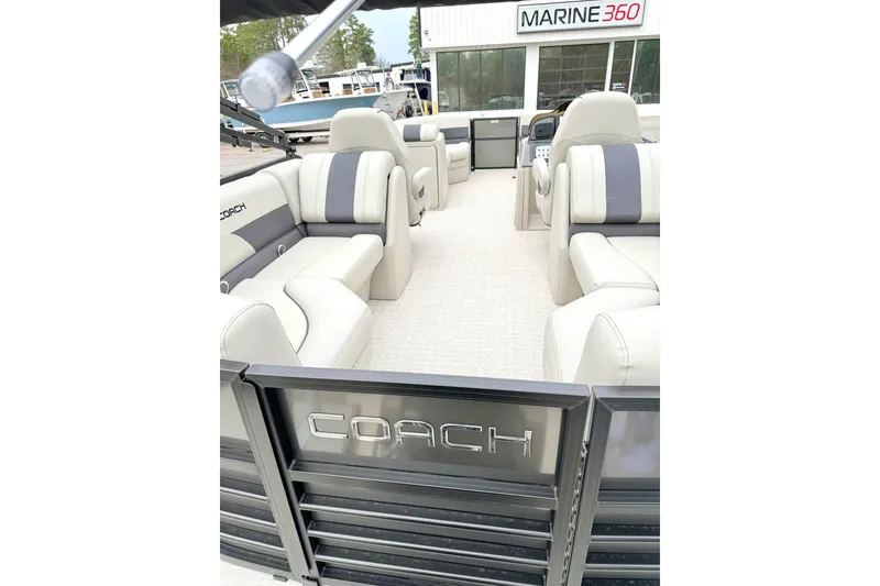 Slide: The Image of 2026 Coach Pontoons 223 RFC interior with luxurious seating at Marine 360 dealership. - 5