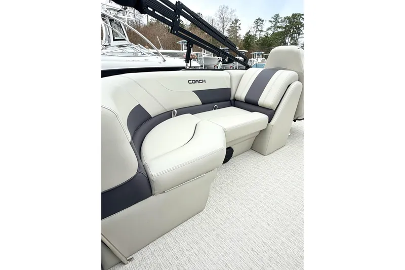 Slide: The Image of 2026 Coach Pontoons 223 RFC interior with plush seating and modern design. - 6