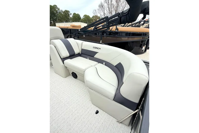 Slide: The Image of 2026 Coach Pontoons 223 RFC interior with plush seating and modern design. - 7