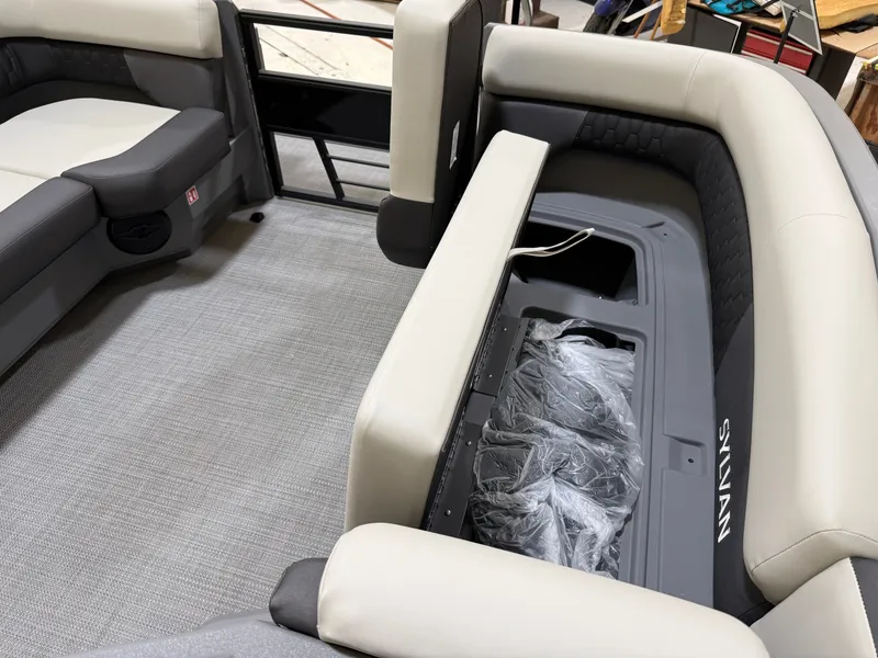 Slide: The Image of Interior of 2026 Sylvan R-22 LZ DH with seating and storage area. - 10