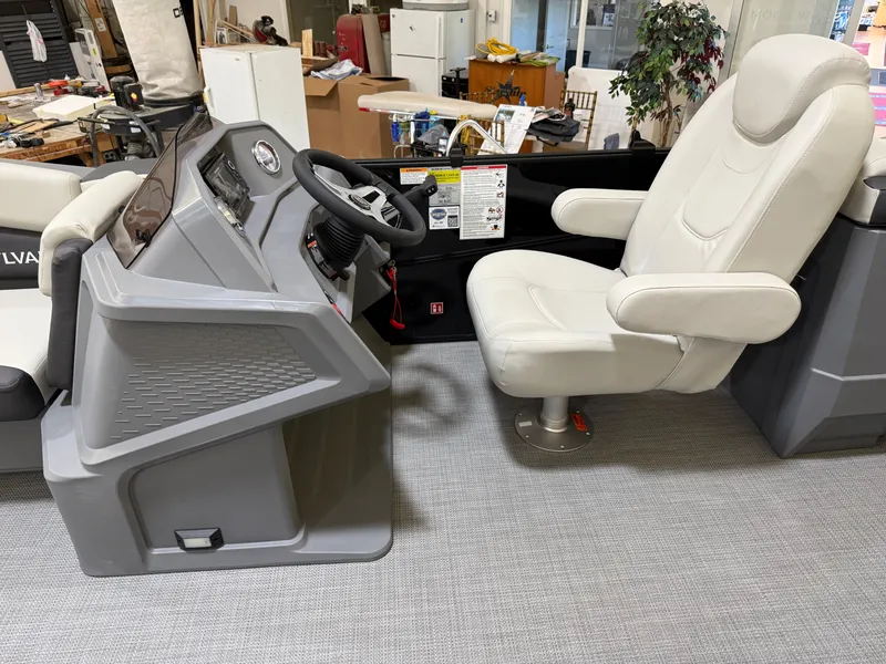 Slide: The Image of Interior of 2026 Sylvan R-22 LZ DH with helm and seat. - 11