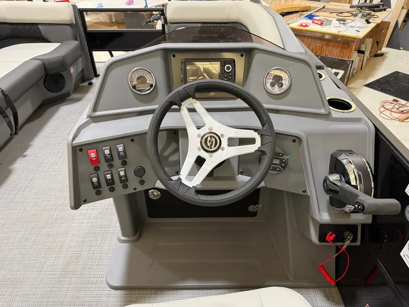 Slide: The Image of 2026 Sylvan R-22 LZ DH helm with steering wheel and controls. - 12