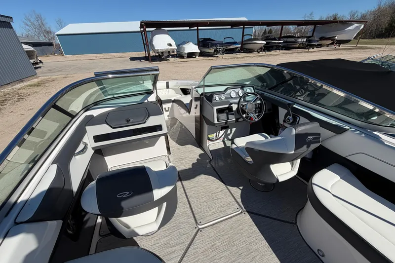 Slide: The Image of 2019 Regal 2300 Bowrider interior with sleek seating and modern dashboard design. - 8